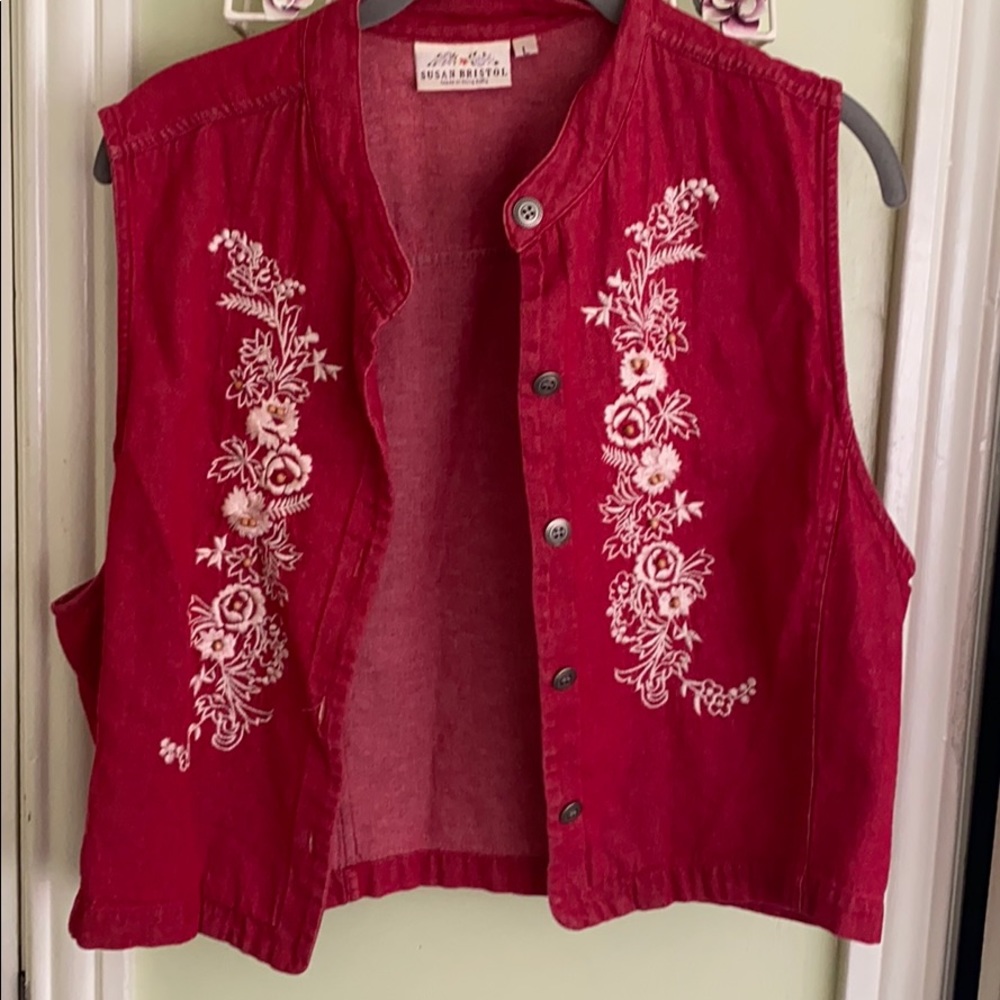 Cute vest—worn but in good condition